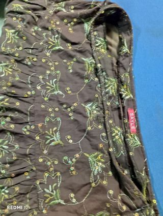 Falda forrada,con cremalleta volantes lentejuelas