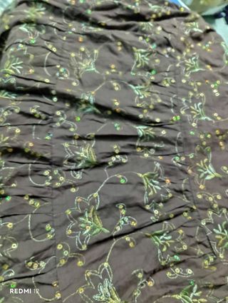 Falda forrada,con cremalleta volantes lentejuelas