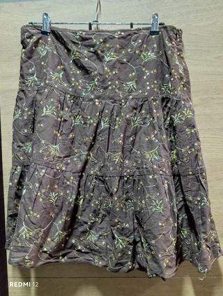 Falda forrada,con cremalleta volantes lentejuelas