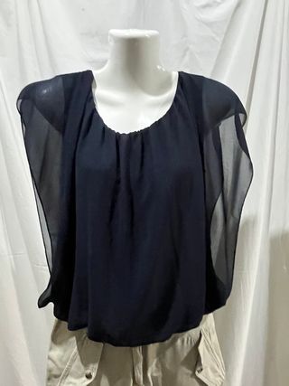 Completo donna: pantaloni beige e casacca nera