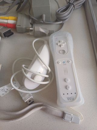 Nintendo Wii + Trivial Pursuit + Wii Sports