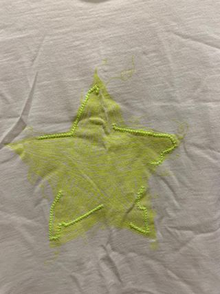 Camiseta TEX con estrellas y pompones