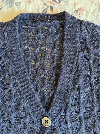 Coprispalle blu con bottoni