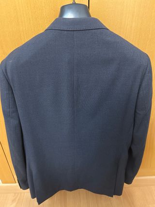 Traje gris en perfecto estado