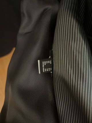 Traje gris en perfecto estado