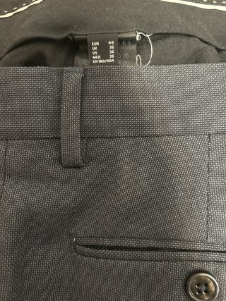 Traje gris en perfecto estado