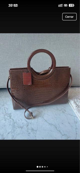 Bolso Victorio y Lucchino piel vaca sin usar