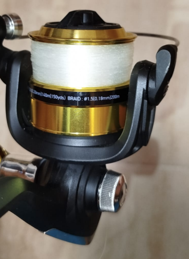 Caña de pescar con carrete