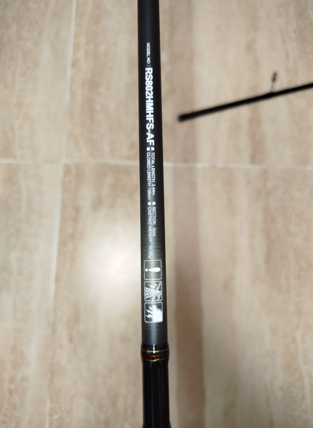 Caña de pescar con carrete