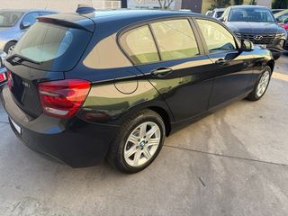 BMW 118i AUTOMATICO CUERO BEIGE LIBRO GARANTIA