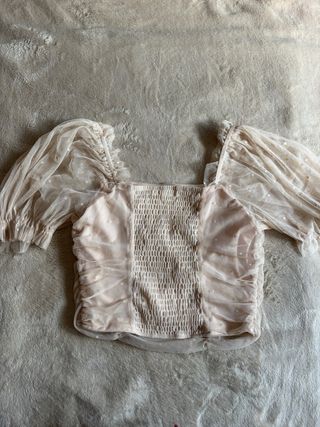 Top rosa empolvado con topos