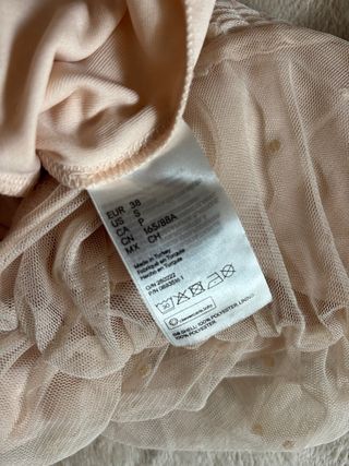 Top rosa empolvado con topos