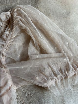 Top rosa empolvado con topos