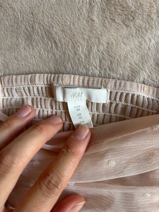 Top rosa empolvado con topos