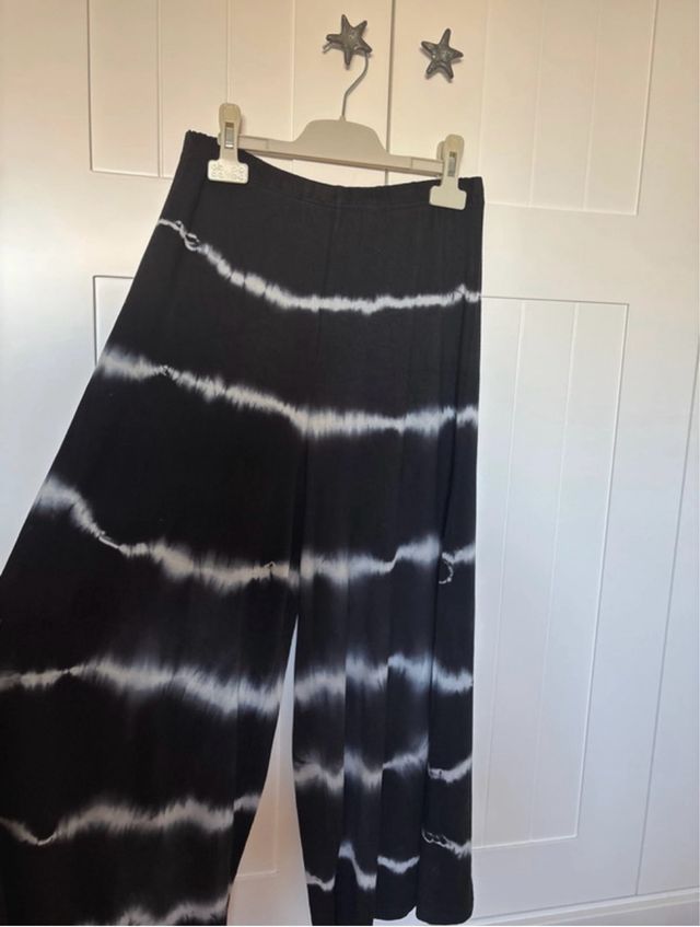 Pantalón fluido tobillero tie-dye