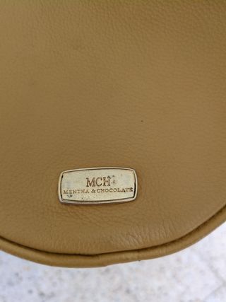 Bolso redondo amarillo mostaza pequeño