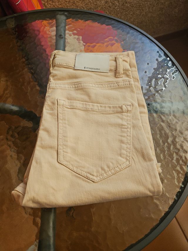 Pantaloni in jeans beige da bambina Stradivarius