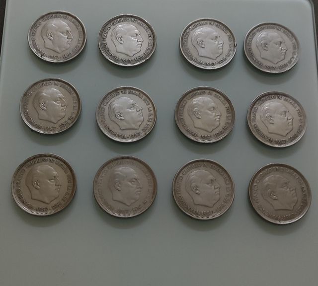 Lote 12 monedas 50 pesetas 1957
