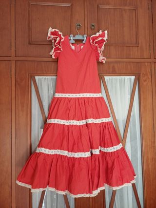 Traje de flamenca coloo CORAL con volantes NIÑA
