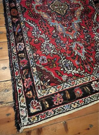 Alfombra persa antigua roja y negra