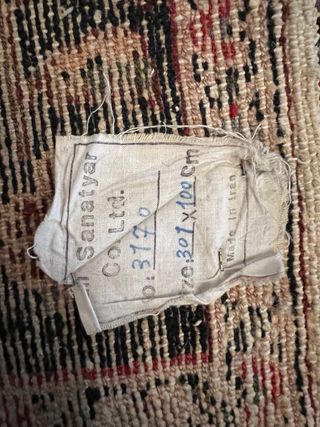 Alfombra persa antigua roja y negra