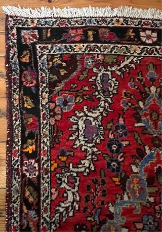 Alfombra persa antigua roja y negra