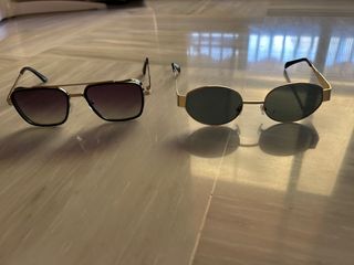 Gafas de sol doradas y negras