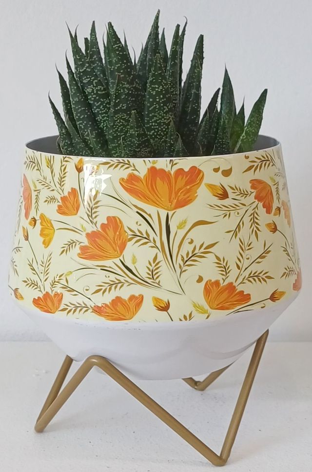 Fioriera in ferro con supporto floreale