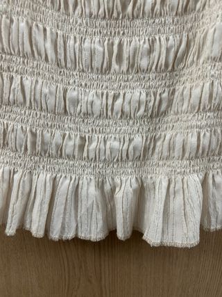 Top peplum marfil