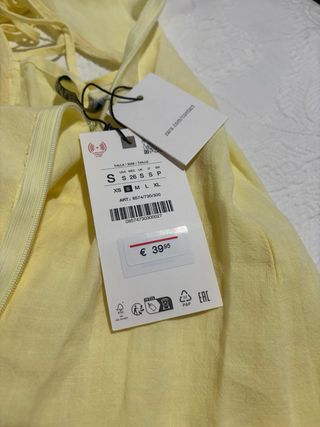 Vestido midi de ramio con volante