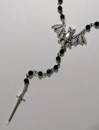 bat rosary with glass beads and sword pendant