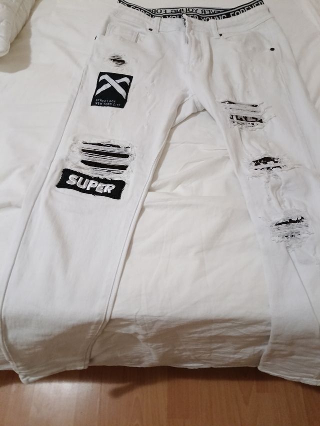 Pantalones blancos con estampados talla 42