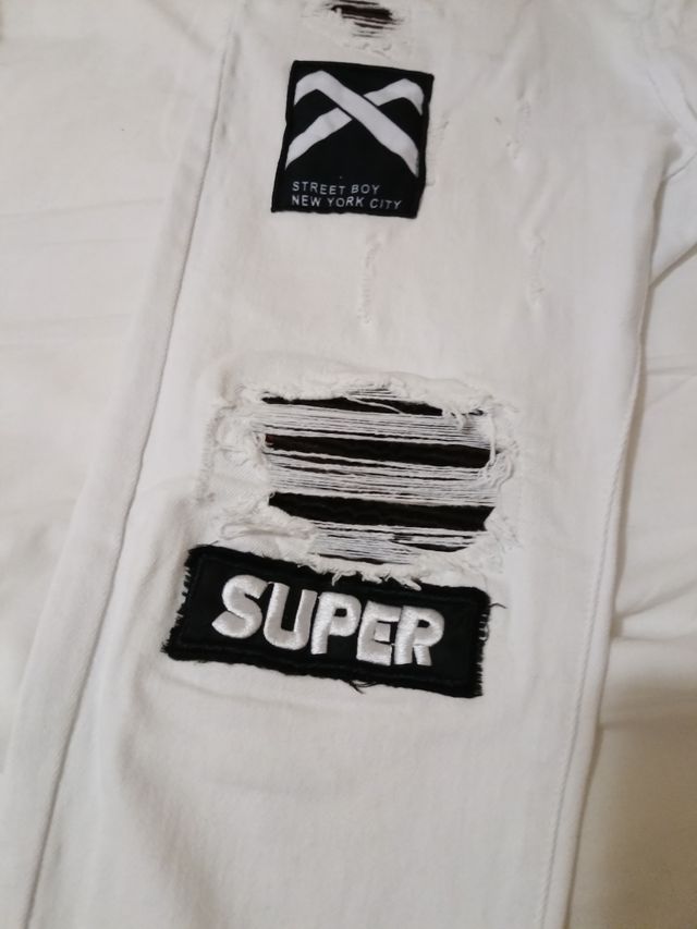 Pantalones blancos con estampados talla 42