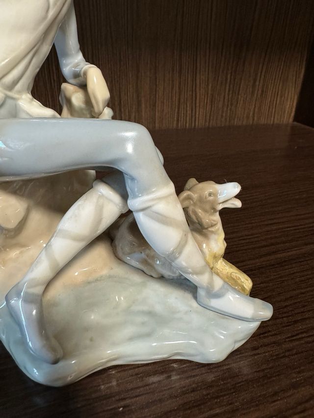 Figura Lladró: niño con perro