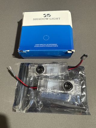 luces proyectores led puerta BMW