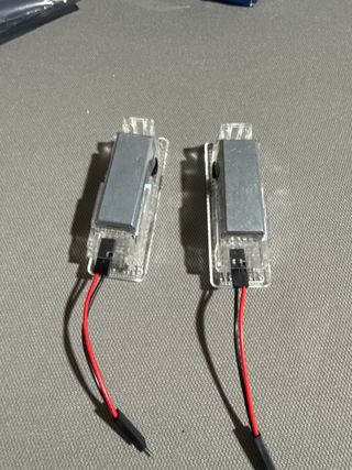 luces proyectores led puerta BMW