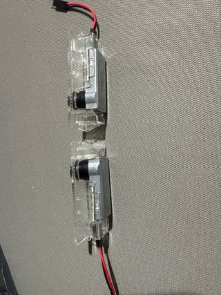 luces proyectores led puerta BMW
