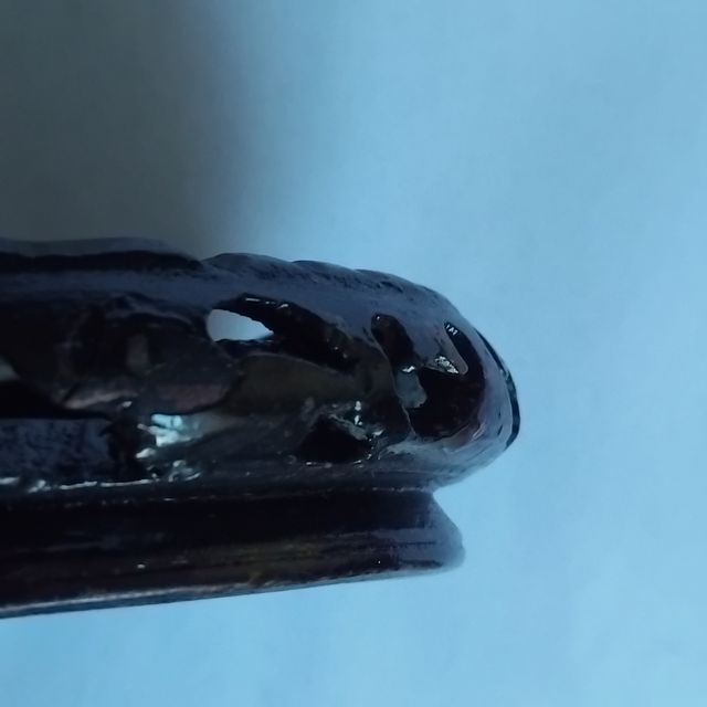 Peça decorativa em madeira castanha