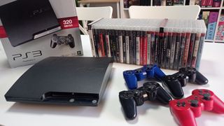 PS3 Slim + 30 juegos + 4 mandos