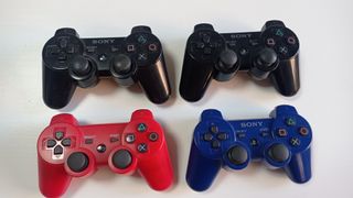 PS3 Slim + 30 juegos + 4 mandos