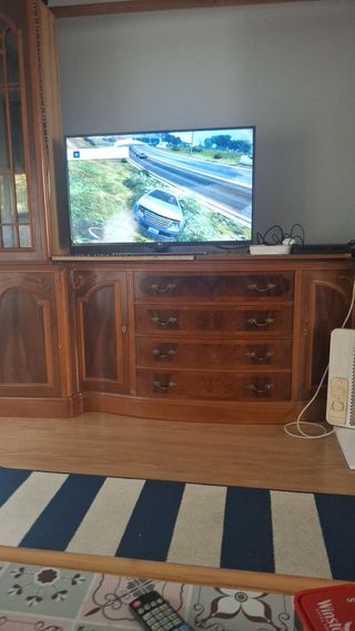 PS4 (PlayStation 4) Sony Negra con juegos y mando