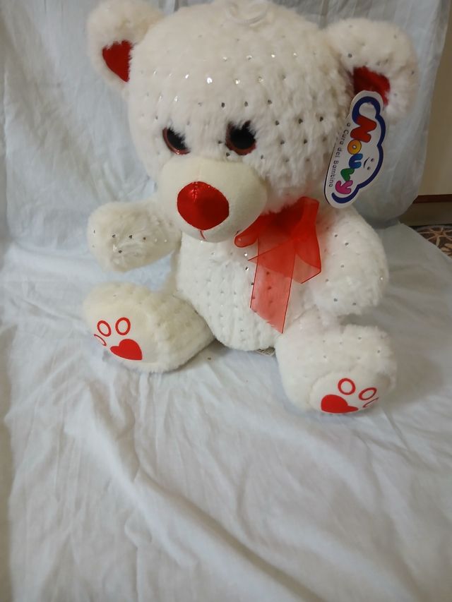 Orsetto bianco con paillettes e fiocco rosso