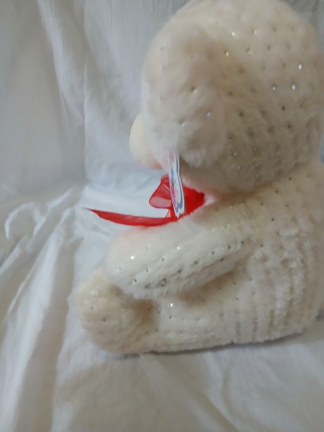 Orsetto bianco con paillettes e fiocco rosso