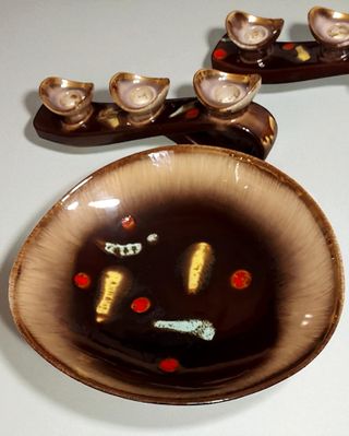 Centrotavola e portacandele in ceramica