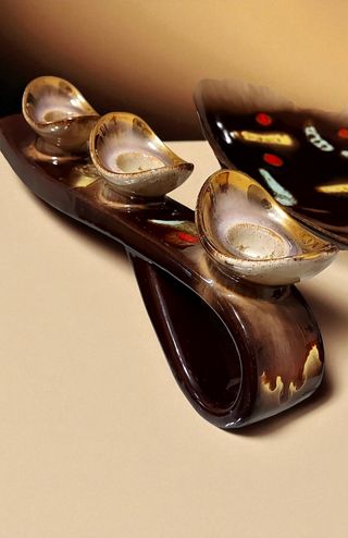 Centrotavola e portacandele in ceramica