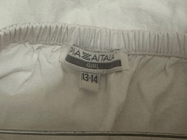 Maglietta bianca manica lunga con volant