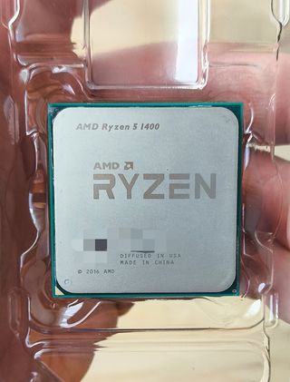 AMD Ryzen 5 1400 + disipador y caja oficial