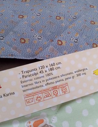Trapunta e paracolpi culla