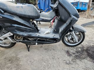 Yamaha Cygnus 125 Despiece pasta lateral