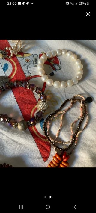 Lote de pulseras perlas y moradas